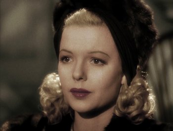 Movie still from “Holiday Inn” (1942), directed by Robert Allen – A person wearing a hat; Close Up shot, Over the shoulder angle