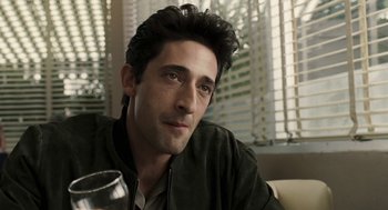 Movie still from “Hollywoodland” (2006), directed by Allen Coulter – A person sitting in front of a window; Close Up shot, Over the shoulder angle