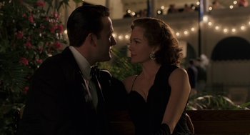 Movie still from “Hollywoodland” (2006), directed by Allen Coulter – A man and a woman in a black dress; Close Up shot, Over the shoulder angle