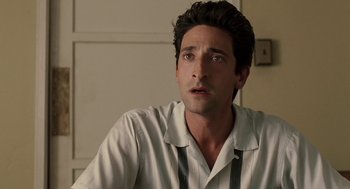 Movie still from “Hollywoodland” (2006), directed by Allen Coulter – A person wearing a white shirt; Close Up shot, Over the shoulder angle