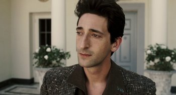 Movie still from “Hollywoodland” (2006), directed by Allen Coulter – A person wearing a jacket; Close Up shot, High angle