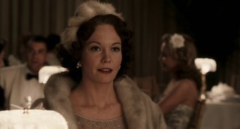 Movie still from “Hollywoodland” (2006), directed by Allen Coulter – A woman wearing a fur coat and a hat; Close Up shot, Over the shoulder angle