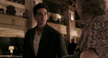 Movie still from “Hollywoodland” (2006), directed by Allen Coulter – A man standing in front of a woman; Close Up shot, Over the shoulder angle