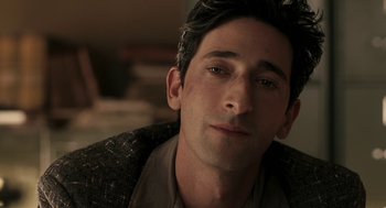 Movie still from “Hollywoodland” (2006), directed by Allen Coulter – A person wearing a jacket; Close Up shot, Over the shoulder angle