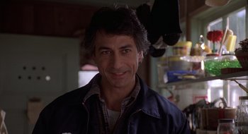 Movie still from “Home for the Holidays” (1995), directed by Jodie Foster – A person wearing a jacket; Close Up shot, Low angle