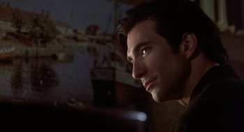 Movie still from “Home for the Holidays” (1995), directed by Jodie Foster – A person looking at the camera; Close Up shot, Over the shoulder angle