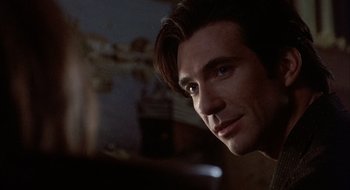 Movie still from “Home for the Holidays” (1995), directed by Jodie Foster – A person looking at the camera; Close Up shot, Over the shoulder angle