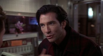 Movie still from “Home for the Holidays” (1995), directed by Jodie Foster – A person with long hair; Close Up shot, Over the shoulder angle