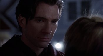 Movie still from “Home for the Holidays” (1995), directed by Jodie Foster – A man's face in the dark; Close Up shot, Over the shoulder angle