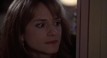 Movie still from “Home for the Holidays” (1995), directed by Jodie Foster – A person with long hair; Close Up shot, Over the shoulder angle
