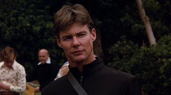 Movie still from “Hooper” (1978), directed by Hal Needham – A person wearing a black jacket; Close Up shot, Low angle