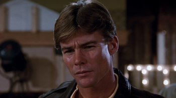 Movie still from “Hooper” (1978), directed by Hal Needham – A person wearing a leather jacket; Close Up shot, Low angle