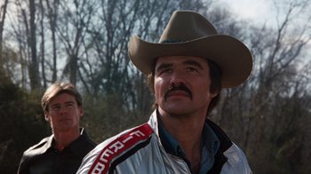 Movie still from “Hooper” (1978), directed by Hal Needham – A man with a mustache wearing a cowboy hat; Close Up shot, Low angle