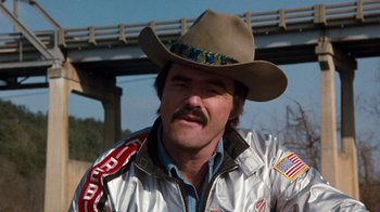 Movie still from “Hooper” (1978), directed by Hal Needham – A man with a mustache wearing a cowboy hat; Close Up shot, Low angle