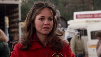 Movie still from “Hooper” (1978), directed by Hal Needham – A person wearing a red jacket; Close Up shot, Over the shoulder angle