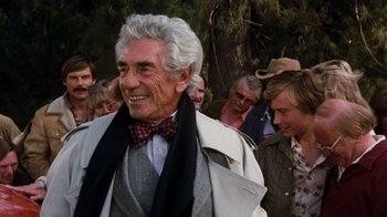 Movie still from “Hooper” (1978), directed by Hal Needham – An old man with a bow tie and a white coat; Close Up shot, Over the shoulder angle