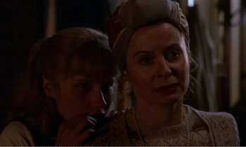 Movie still from “Hope and Glory” (1987), directed by John Boorman – A woman and a child looking at each other; Close Up shot, Over the shoulder angle