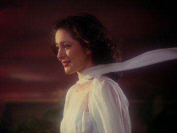 Movie still from “House” (1977), directed by Nobuhiko Ôbayashi – A beautiful young lady wearing a white dress; Close Up shot, Low angle