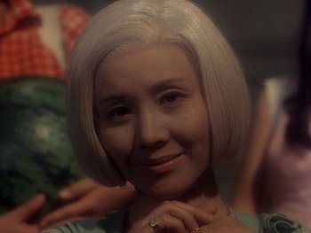 Movie still from “House” (1977), directed by Nobuhiko Ôbayashi – A person wearing a ring; Close Up shot, Over the shoulder angle