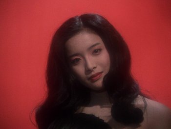Movie still from “House” (1977), directed by Nobuhiko Ôbayashi – A beautiful young woman with long black hair; Close Up shot, Low angle