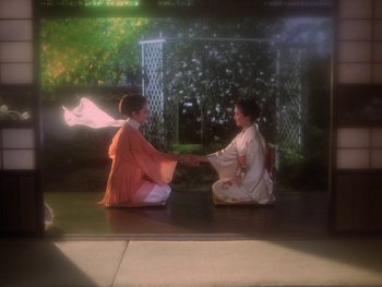 Movie still from “House” (1977), directed by Nobuhiko Ôbayashi – Two women dressed in traditional japanese clothing holding hands; Wide shot, High angle