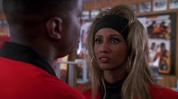 Movie still from “House Party 2” (1991), directed by Doug McHenry – A man and a woman talking to each other; Close Up shot, Over the shoulder angle