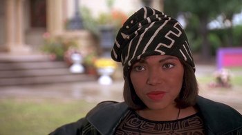 Movie still from “House Party 2” (1991), directed by Doug McHenry – A person wearing a hat; Close Up shot, High angle