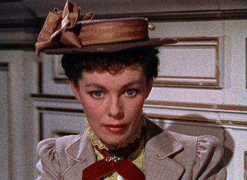 Movie still from “House of Wax” (1953), directed by André De Toth – A person wearing a hat; Close Up shot, High angle