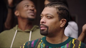 Movie still from “How High 2” (2019), directed by Bruce Leddy – A man with a beard is looking at the camera; Close Up shot, Over the shoulder angle