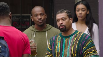 Movie still from “How High 2” (2019), directed by Bruce Leddy – A group of people standing next to each other; Medium shot, Over the shoulder angle