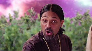 Movie still from “How High 2” (2019), directed by Bruce Leddy – A person with a beard; Medium shot, Over the shoulder angle