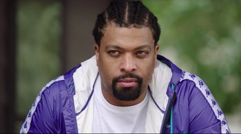 Movie still from “How High 2” (2019), directed by Bruce Leddy – A person with a beard; Close Up shot, Low angle