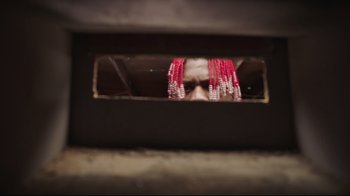 Movie still from “How High 2” (2019), directed by Bruce Leddy – A man with red hair looking into a mirror; Close Up shot, High angle