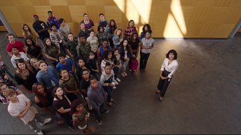Movie still from “How High 2” (2019), directed by Bruce Leddy – A large group of people standing in a room together; Extreme Wide shot, High angle