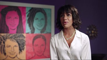 Movie still from “How High 2” (2019), directed by Bruce Leddy – A woman standing in front of a painting of a woman; Medium shot, Over the shoulder angle