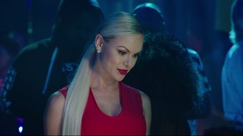 Movie still from “How High 2” (2019), directed by Bruce Leddy – A woman with long blonde hair wearing a red top; Close Up shot, Over the shoulder angle