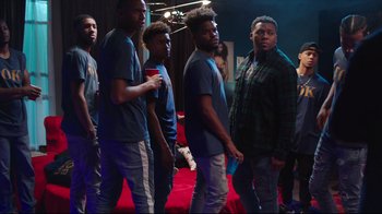 Movie still from “How High 2” (2019), directed by Bruce Leddy – A group of young men standing next to each other; Wide shot, Low angle