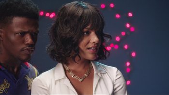 Movie still from “How High 2” (2019), directed by Bruce Leddy – A person wearing a white shirt; Close Up shot, Over the shoulder angle