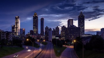 Movie still from “How High 2” (2019), directed by Bruce Leddy – A view of a city at night from a bridge; Extreme Wide shot, High angle