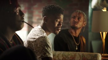 Movie still from “How High 2” (2019), directed by Bruce Leddy – A man sitting in front of a mirror next to another man; Close Up shot, Over the shoulder angle