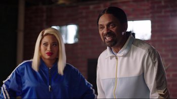 Movie still from “How High 2” (2019), directed by Bruce Leddy – A man and a woman standing next to each other; Medium shot, Over the shoulder angle