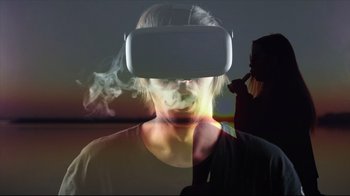 Movie still from “How High 2” (2019), directed by Bruce Leddy – A person wearing a virtual reality headset with smoke billowing out of it; Close Up shot, Low angle
