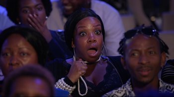 Movie still from “How High 2” (2019), directed by Bruce Leddy – A woman with a surprised look on her face; Close Up shot, High angle