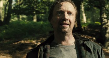 Movie still from “How I Live Now” (2013), directed by Kevin Macdonald – A person wearing a jacket; Close Up shot, Low angle