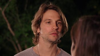Movie still from “How It Ends” (2021), directed by Daryl Wein – A person with long blonde hair; Close Up shot, Over the shoulder angle