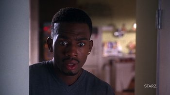 Movie still from “How to Be a Player” (1997), directed by Lionel C. Martin – A person with his eyes wide open; Close Up shot, Over the shoulder angle
