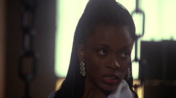 Movie still from “How to Be a Player” (1997), directed by Lionel C. Martin – A person with long hair; Close Up shot, Low angle