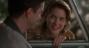 Movie still from “How to Make an American Quilt” (1995), directed by Jocelyn Moorhouse – A man and a woman looking at each other in a car; Close Up shot, Over the shoulder angle