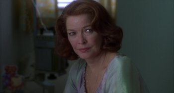 Movie still from “How to Make an American Quilt” (1995), directed by Jocelyn Moorhouse – A person wearing a necklace; Close Up shot, Over the shoulder angle