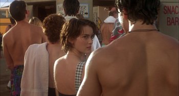 Movie still from “How to Make an American Quilt” (1995), directed by Jocelyn Moorhouse – A woman standing next to a man; Close Up shot, Over the shoulder angle